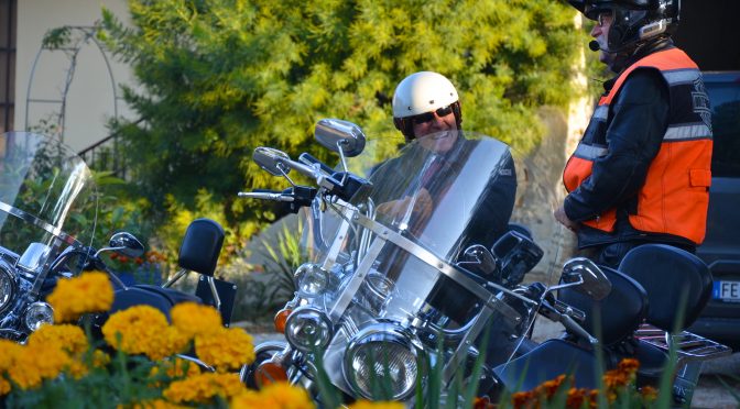 Happy guest on Harley motorcycle